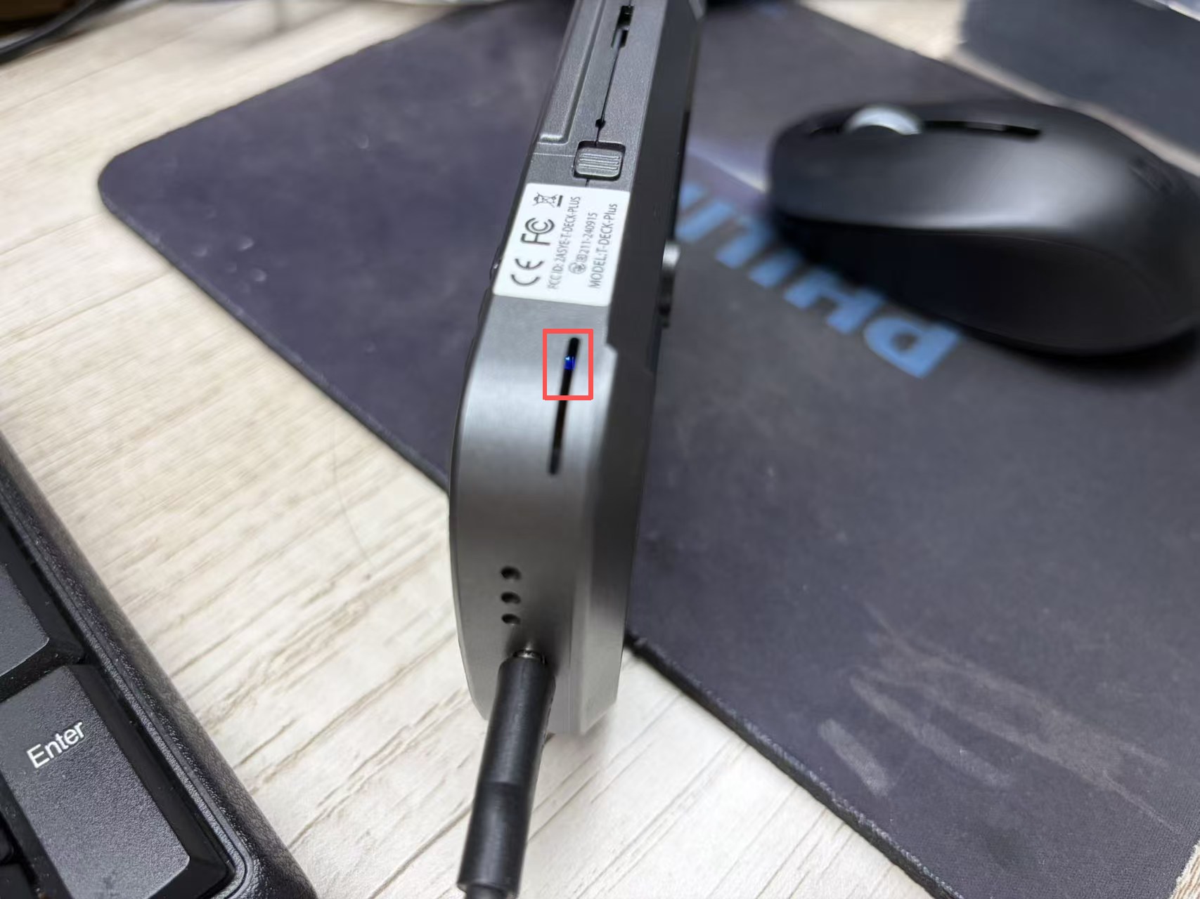Location of the blue charging indicator on the bottom of T-Deck Plus
